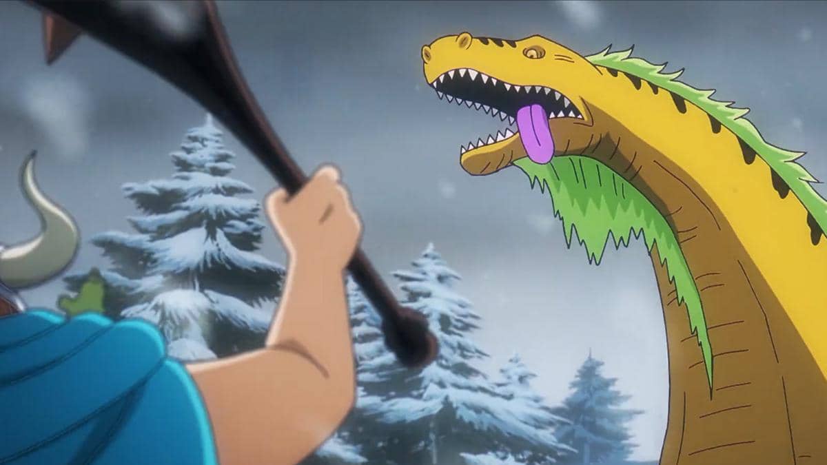 Goldberg menghadapi seekor dinosaurus besar dalam adegan menegangkan anime One Piece produksi Toei Animation.