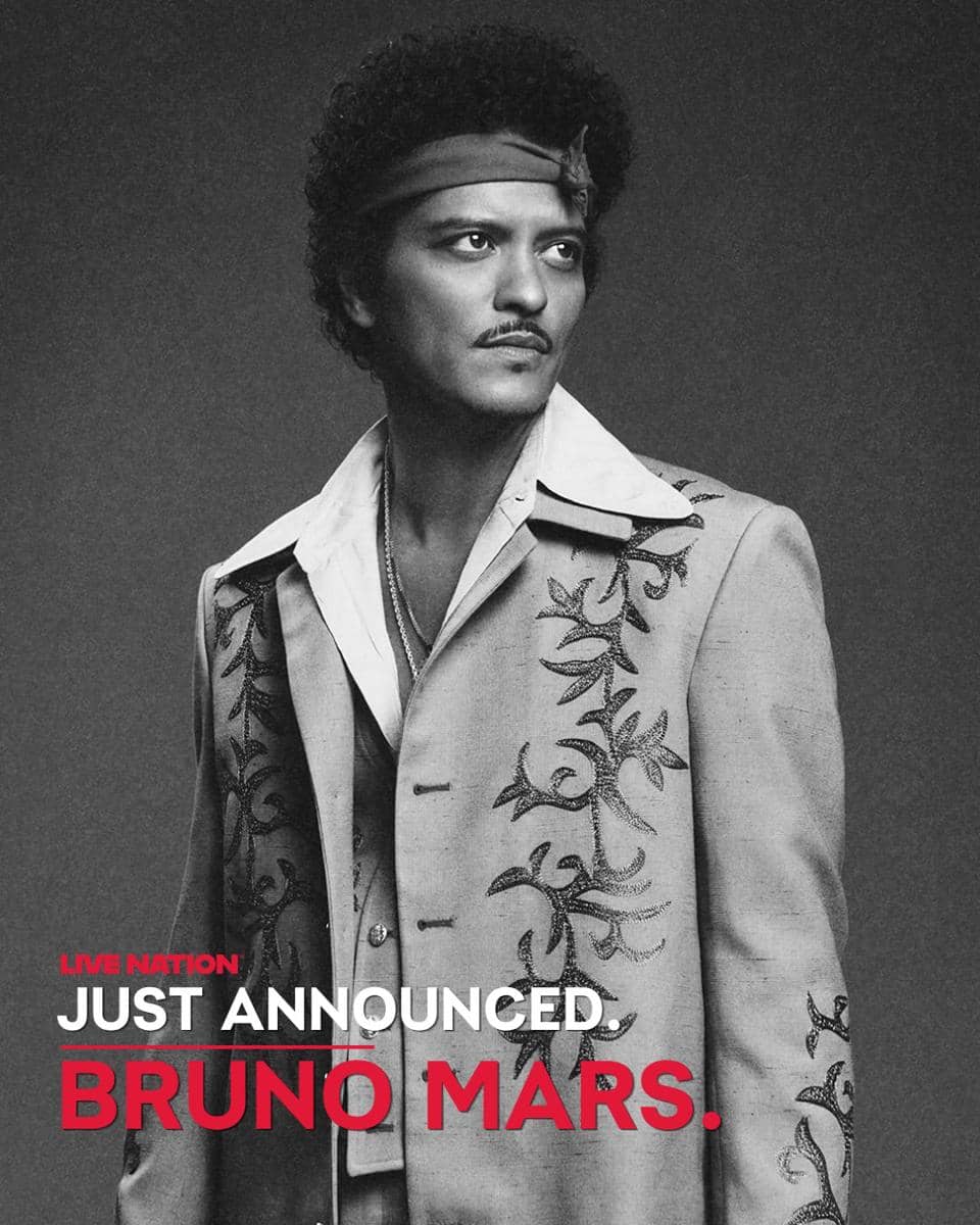 Poster konser Bruno Mars dengan latar gelap dan tulisan nama sang penyanyi, diunggah oleh Live Nation Asia.