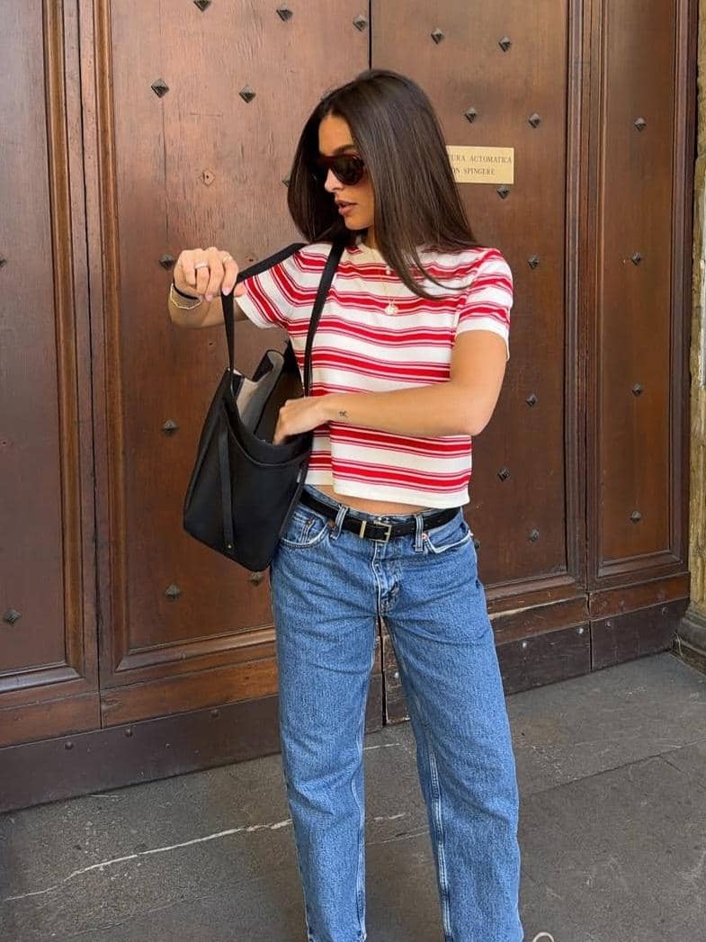 Gemma Pinto berpose mengenakan OOTD bergaya kasual dalam potret fesyen yang diunggah di akun Instagram pribadinya.