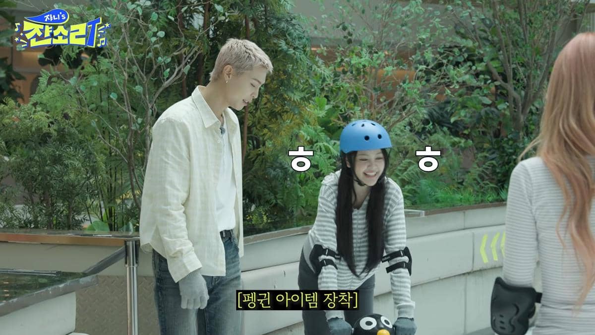 Carmen Hearts2Hearts bermain seluncur es bersama Johnny dari NCT 127 dalam konten YouTube 쟌소리.