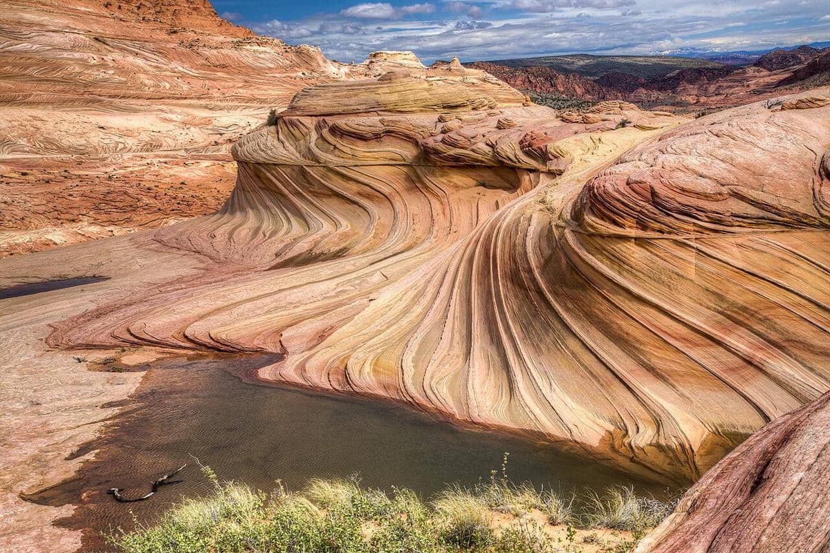 The Wave, formasi batuan bergelombang di Coyote Buttes North di dalam Monumen Nasional Vermilion Cliffs.