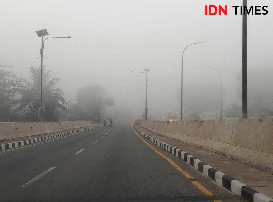 Kondisi Kota Palembang yang diselimuti kabut asap akibat Karhutla. 