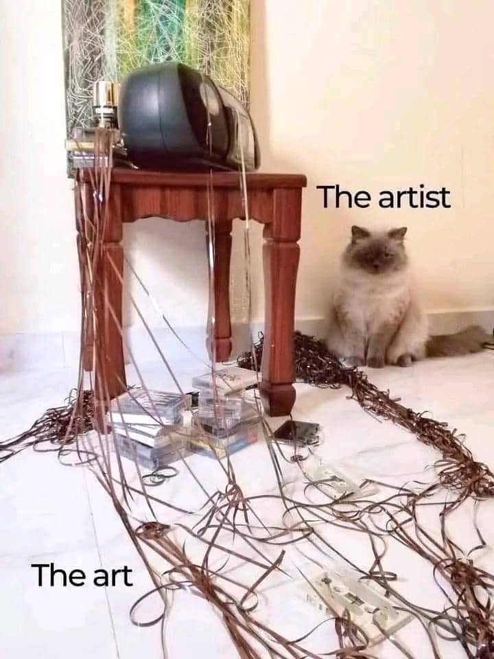Meme kucing bertema seni dari Reddit dengan humor ringan seputar ekspresi dan karya artistik yang unik.