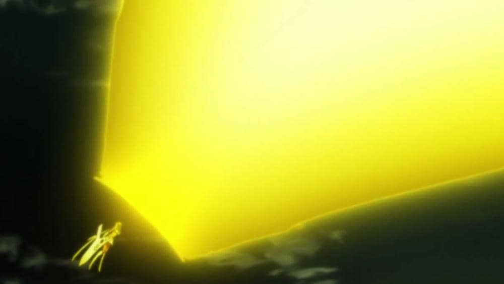 Semburan energi Cero berwarna emas dari tangan Harribel dalam anime Bleach, dengan cahaya terang memenuhi latar.