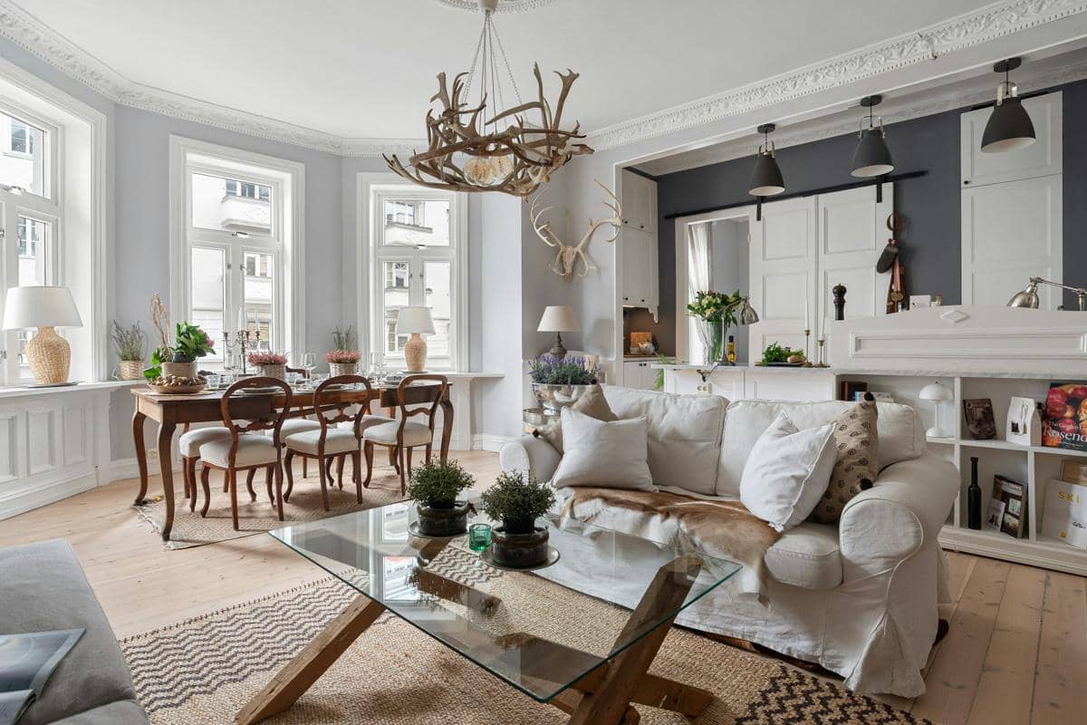 https://unsplash.com/id/foto/ruang-tamu-yang-dipenuhi-dengan-furnitur-dan-perapian-FEJNPW5szy4