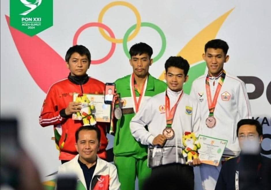 Aksi Fereddy Sinaga pada semifinal Wushu Sanda Asian Games 2026