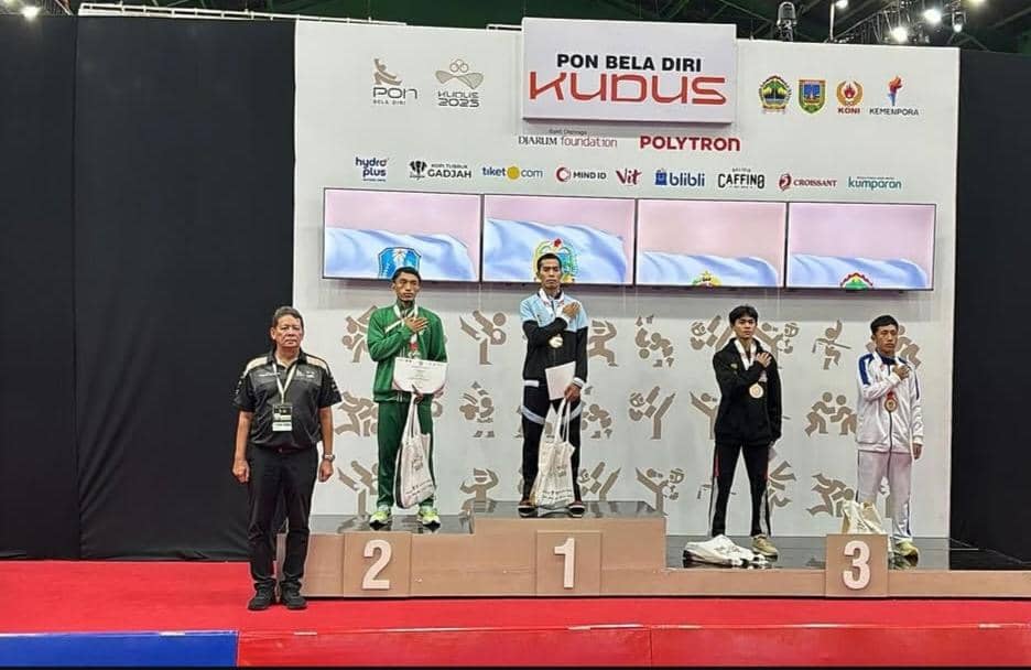 Fereddy Sinaga saat bertanding dan meraih emas di PON XXI 2024