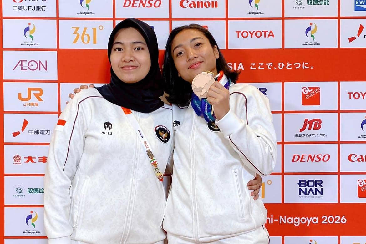 Coki (kanan) bersama tim Indonesia di Asian Games 2026 Aichi-Nagoya.