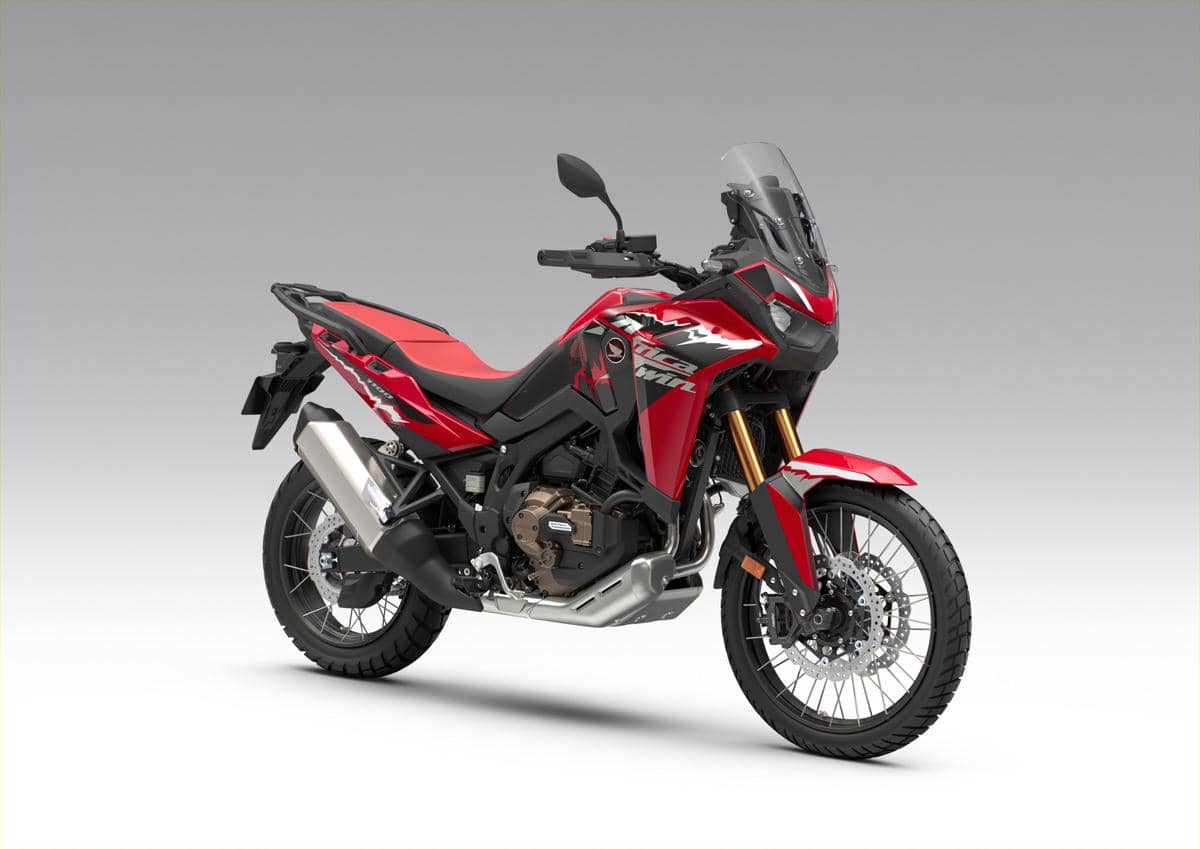 Tampilan warna Grand Prix Red pada sepeda motor produksi AHM dengan bodi berkelir merah dan detail grafis.