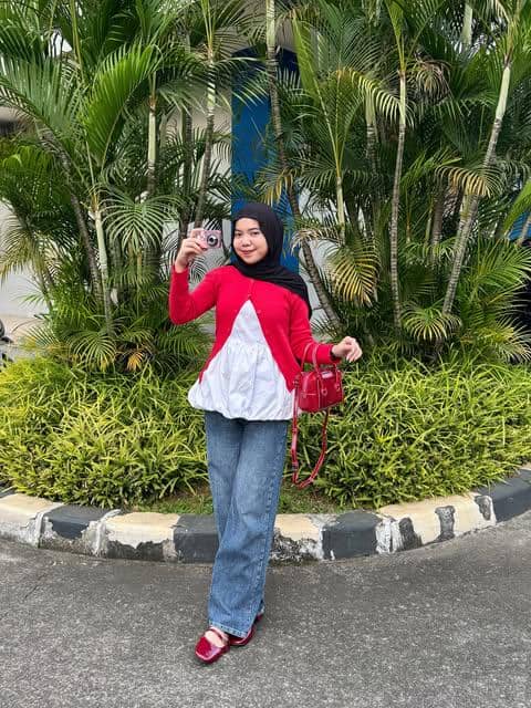 Cindy Mayasari mengenakan busana OOTD liburan bergaya santai dalam unggahan Instagram pribadinya.