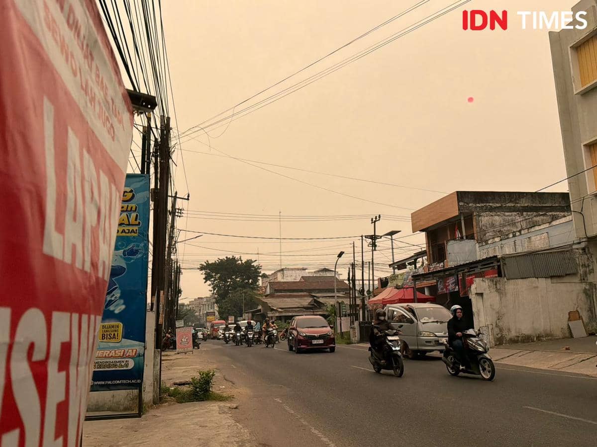 Penyebab Langit Palembang Berubah Kuning, Pengaruh Kabut Asap?