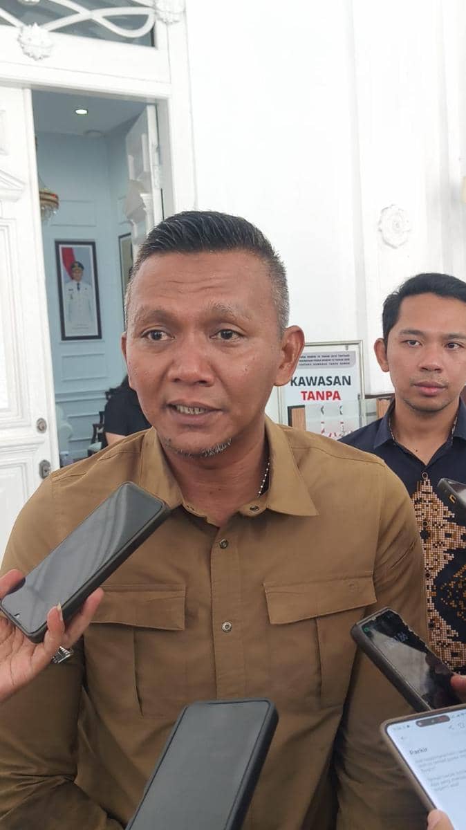 Wakil Wali Kota Bogor pasca Rapat Optimalisasi Retribusi Parkir di Kota Bogor dalam kegiatan pemerintah daerah.