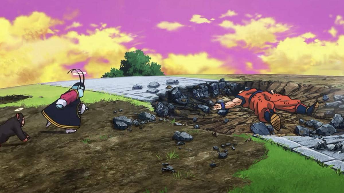 Goku terbaring tumbang usai dikalahkan Beerus dalam adegan anime Dragon Ball Super: Beerus karya Toei.